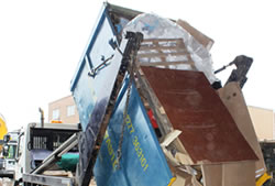 Skip Hire in Romford unloading a skip at the transfer station