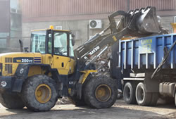 Skip Hire in Romford loading a lorry